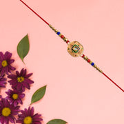 Traditional Kundan Rakhi With Antique Gold Finish  Multicolor Beads thumbnail 1