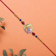 Ganesh Rakhi With Vibrant Enamel Work thumbnail 3