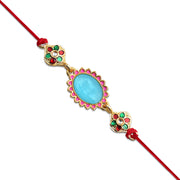 Blue Stone Rakhi With Floral Meenakari Accents thumbnail 1
