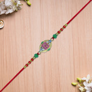 Om Rakhi With Decorative Beads And Stone Work thumbnail 1
