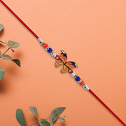 Vibrant Butterfly Rakhi With Colorful Beads  Red Mauli Thread thumbnail 2