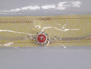 Silver Plated Om Rakhi With Red Enamel And Chain Thread Design thumbnail 1