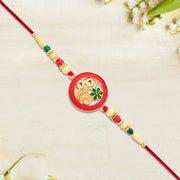 Round Designer Paisley Rakhi With Floral Charm thumbnail 3