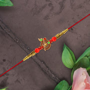 Red Beaded Rakhi With Krishna Symbol thumbnail 3
