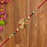 Traditional Kundan Rakhi With Golden Floral Base And Rudraksha Beads