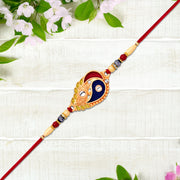 Elegant Rakhi With Enamel Paisley Design And Gold-tone Embellishments thumbnail 2