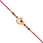 Golden Peacock Feather Rakhi With Red Thread And Kundan Detailing thumbnail 2