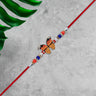 Vibrant Butterfly Rakhi With Colorful Beads  Red Mauli Thread