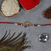 Artistic Mor Pankh Rakhi With Colorful Enamel And Traditional Thread thumbnail 3