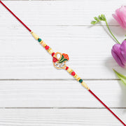 Divine Ganpati Rakhi With Enamel Work And Traditional Beads thumbnail 2
