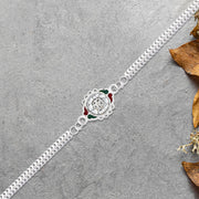 Stylish Rakhi With Intricate Floral Motif And Enamel Touches thumbnail 3