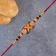 Elegant Red-green Bead Rakhi With Intricate Golden Flower Motif thumbnail 1