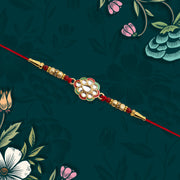 Kundan Work Floral Rakhi With Red Thread thumbnail 1