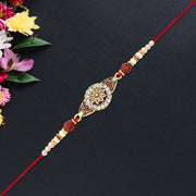 Rudraksha Rakhi With Stone-studded Mandala Design thumbnail 1
