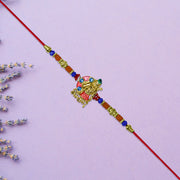 Lord Jagannath Rakhi With Multicolor Beads thumbnail 3