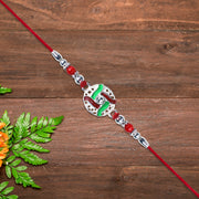 Silver-tone Swastik Rakhi thumbnail 2
