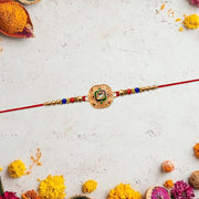 Traditional Kundan Rakhi With Antique Gold Finish  Multicolor Beads thumbnail 3