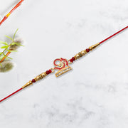 Stylized Trishul And Shivling Rakhi thumbnail 1