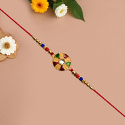 Elegant Multicolor Kundan Rakhi With Golden Floral Round Dial And Beaded Red Thread thumbnail 3