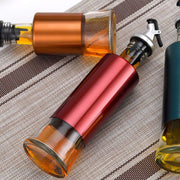 Glass Oil Dispenser With Plastic Covering Oil And Vinegar Bottle (300 Ml) thumbnail 1