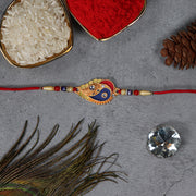 Elegant Rakhi With Enamel Paisley Design And Gold-tone Embellishments thumbnail 3