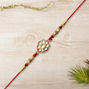 Kundan Work Floral Rakhi With Red Thread thumbnail 2