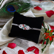 Elegant Floral Rakhi With Red-green Enamel Work And Metal Chain thumbnail 1