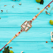 Designer Rakhi With Swastik-inspired Kundan Dial And Decorative Beads thumbnail 2
