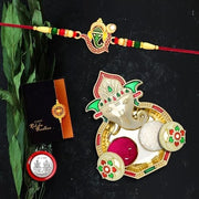 Rakhi For Brother Set Of 1 With Dish Silver Coin  Greeting Card Rakhi For Brother And Bhabhi Rakhi With Gift For Brother Rakhi For Kids Rakhi Set Rakhi Combo (K1_309_aa3) thumbnail 1