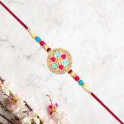 Round Floral Rakhi With Pink-blue Enamel And Beaded Thread thumbnail 3