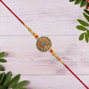Royal Designer Rakhi With Kundan Centerpiece Red  Green Enamel Work And Golden Beads thumbnail 1