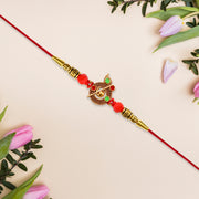 Red Beaded Rakhi With Krishna Symbol thumbnail 1