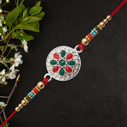 Silver Plated Floral Rakhi With Red  Green Stones thumbnail 2