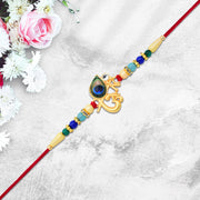 Divine Govind Rakhi With Peacock Feather Design And Multicolor Beads thumbnail 2