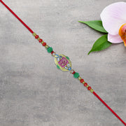 Om Rakhi With Decorative Beads And Stone Work thumbnail 3
