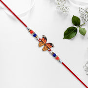 Vibrant Butterfly Rakhi With Colorful Beads  Red Mauli Thread thumbnail 3