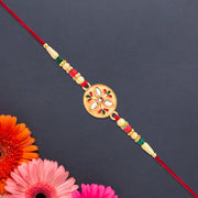 Sacred Kalash Design Rakhi With Embellished Beads And Red Thread thumbnail 1