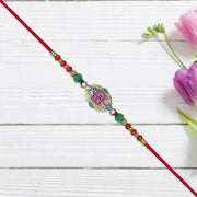 Om Rakhi With Decorative Beads And Stone Work thumbnail 2