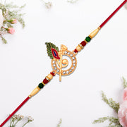 Krishna Flute Rakhi With Stone Studded Peacock Feather Design thumbnail 1