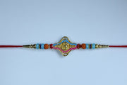 Traditional Om Design Rakhi thumbnail 1