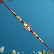 Damru Rakhi With Beads And Floral Detailing thumbnail 2