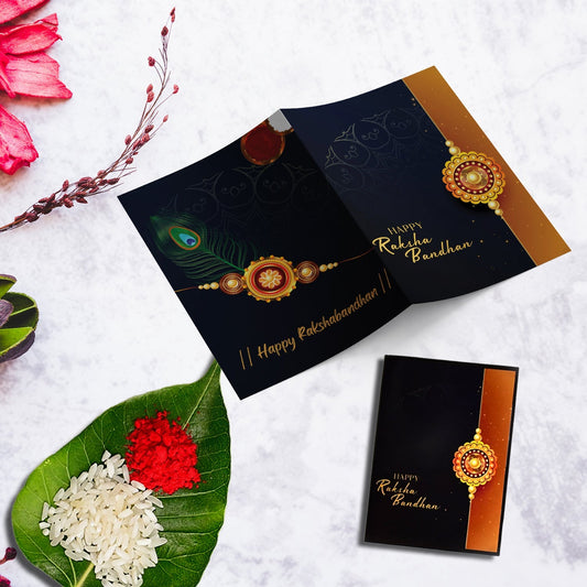 Rakhi Gift Combo With 2 Elegant Rakhis For Brother  Includes Choco Coated Butterscotch Box Silver Coin Roli Chawal  Greeting Card