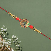 Elegant Round Peacock Design Rakhi thumbnail 2